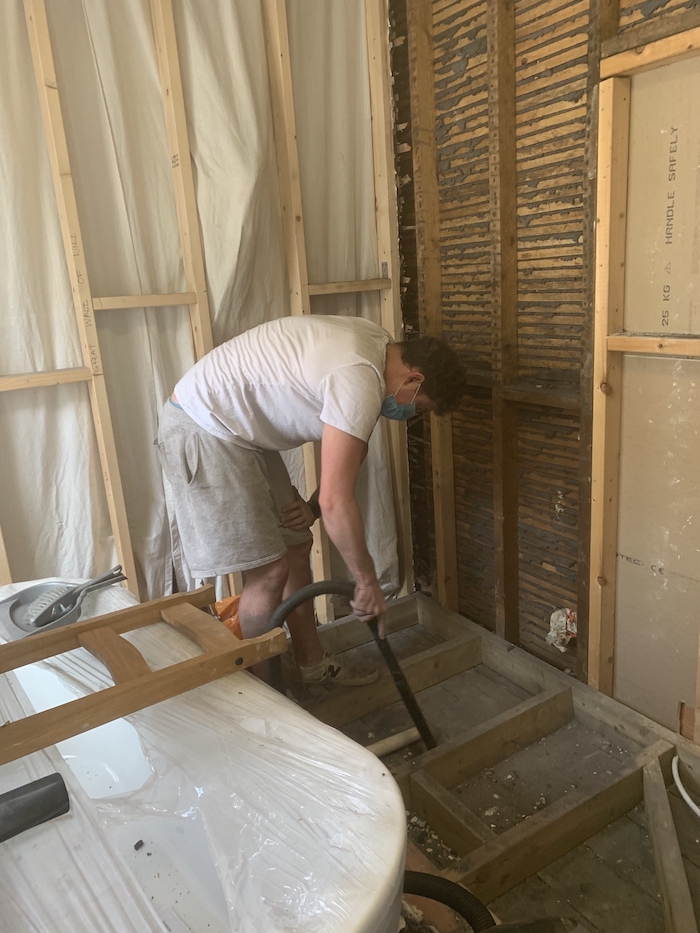 Tidying up after pulling down the plasterboard